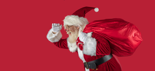 Emotional senior male model old man with a natural white beard Father Christmas