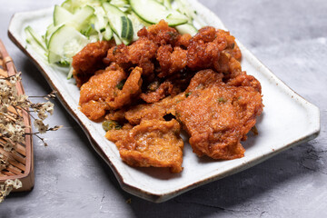 Thai fried fish cakes on the gray table