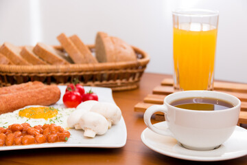 breakfast with coffee and croissant and juice