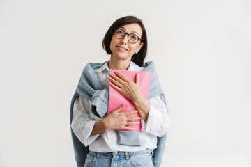 Smiling mature white woman in white shirt