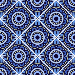 Abstract seamless backdrop. Design for prints, textile, decor, fabric. Round colorful texture in blue and white colors. Mandala background