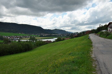 The road leading to the jump of the Doubs on the heights of Villers-le-Lac.