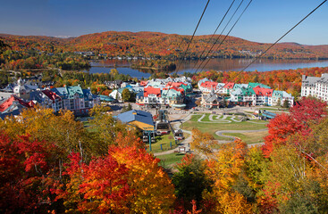 Aerial view of Mont Tremblant resort, funiculars and lake with autumn color leaf, Quebec, Canada