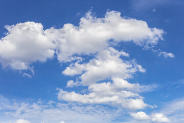 Obraz na płótnie Canvas blue sky background with tiny clouds.