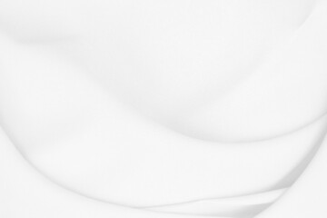 Beautiful white fabric waves, soft focus, used for backgrounds. White cloth background	