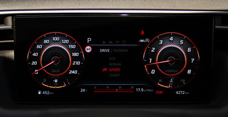 Modern digital car dashboard. Close up of illuminated car digital dashboard.