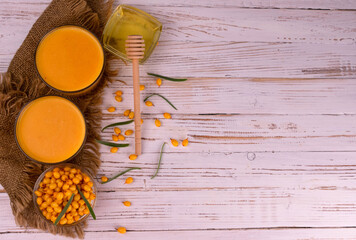 Two Glasses Sea Buckthorn Fruit Juice Honey White Wooden Background Flat Lay