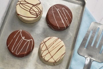 Traditional homemade chocolate covered alfajores. Argentinean gastronomy