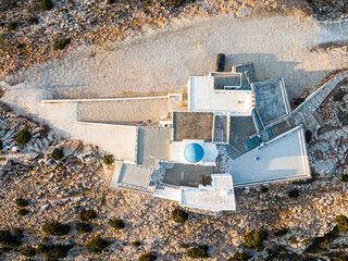 Aerial top view on Ortodox church Agios Symeon, Sifnos island Kamares, Greece - obrazy, fototapety, plakaty