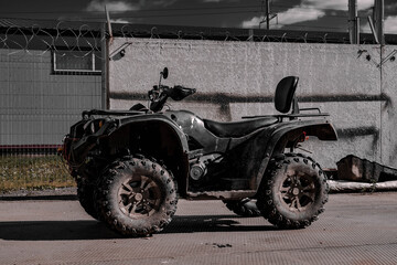 Black and white photo of an ATV in the street