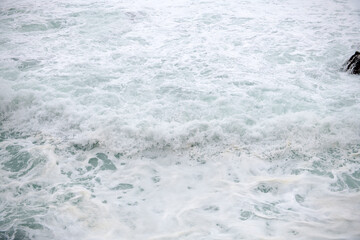 Fototapeta na wymiar Sea wave close up. Blue sea water background, texture