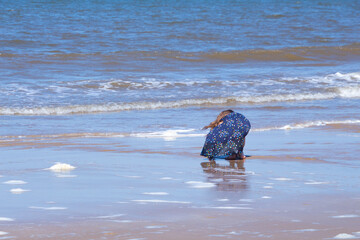 Obraz premium child playing on the beach, british beach, british, summer, british summer, norfolk beach