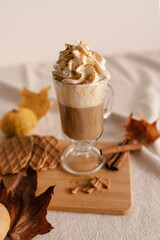 Autumn Latte Cinnamon. Spicy Latte Coffee. Pumpkin, Latte, Halloween, Commercial Content. Cozy Latte Set up. Pumpkin spice latte with whipped cream and fresh cinnamon