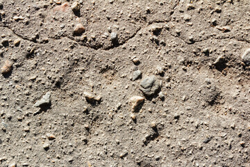 Close-up photo texture of gravel cement ground..