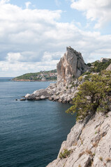 Fototapeta na wymiar Landscape view of Swan Wing rock and Black Sea coastline between Simeiz and Katziveli villages, Crimea, Russia