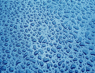 Abstract texture background with raindrops in blue tone