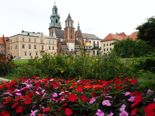 Flower bed and Wawel Cathedral of Krakow Poland
