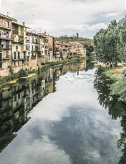 Beautiful views of the towns of Teruel with the reflection of their houses in the river
