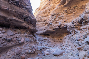 Hiking in a slot canyon of Lake Mead