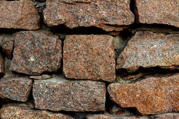 Photo texture of old and ancient stone wall.