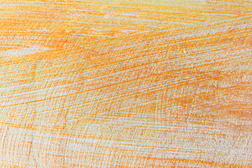 Close-up photo texture of golden colored concrete stucco.