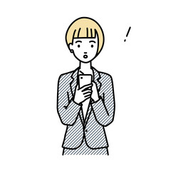 立ってスマートフォンを操作して何かに気づいて驚いたスーツの女性