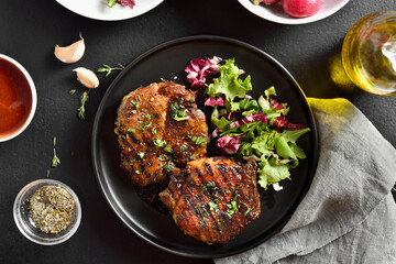 Roasted pork steak with vegetable salad