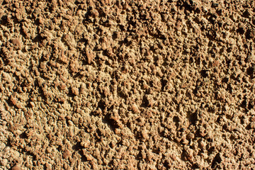 Photo texture of brown colored concrete wall stucco.