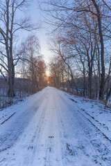 Fototapeta premium frozen path and winter sunset