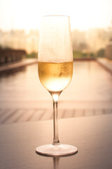 A glass of champagne on the background of the pool, Sao Paulo, Brazil