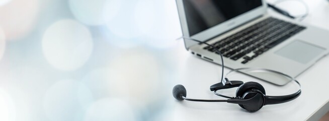 Headset and customer support equipment at call center ready for actively service . Corporate...