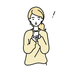 立ってスマートフォンを操作して何かに気づいて驚いたリモートワークの女性