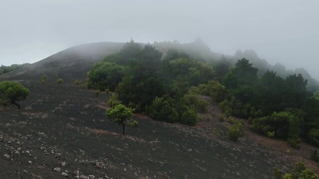 Landscape. Sea of clouds crossing the top of El Hierro island. Canary islands. Spain