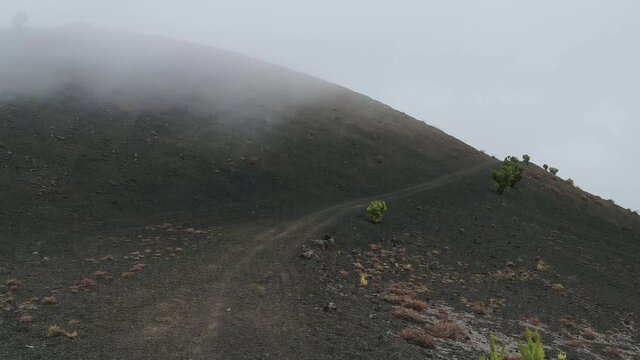 Landscape. Sea of clouds crossing the top of El Hierro island. Canary islands. Spain