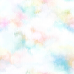 Seamless pale pastel tie dye bokeh texture. Soft tone on tone summer repeat background with washed out sun bleached ink dyed effect. 