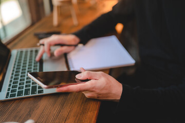 business worker person working at cafe by using laptop computer on online communication technology