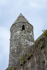 Ancient Round Tower Turret Above an Old Stone Wall, Ireland © EMFA16