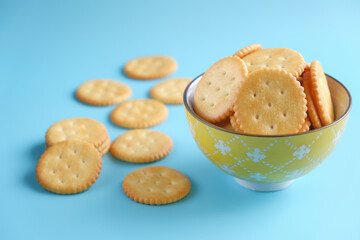 cracker or biscuits stack served in a bowl on background isolated.