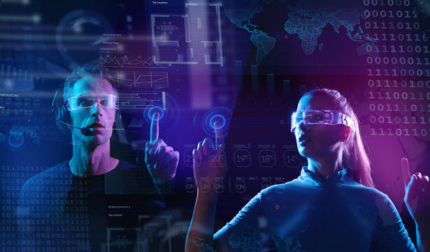 Young woman and man controlling digital environment. Future, mind controlling, digital interface concept.