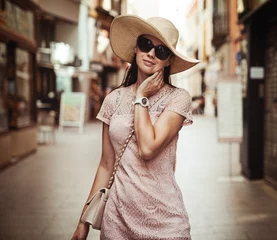 Foto op Plexiglas anti-reflex Happy young woman with straw hat enjoying her summer holidays © konradbak