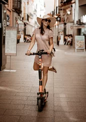 Gordijnen Happy young woman with straw hat enjoying her summer holidays © konradbak