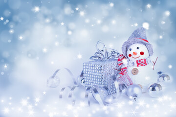 Christmas Greeting Card. Cute Snowman on Winter Holiday Background