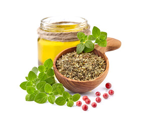 Oregano or marjoram leaves with oil amd red pepper isolated on white background. Oregano fresh and dry. Olive oil with herbs and spice.