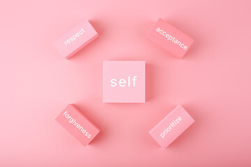 Self love, respect, acceptance, forgiveness and prioritize concept in bright pastel pink colors....