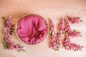pink flowers petals on wooden background