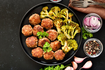 Homemade cutlets and fried broccoli