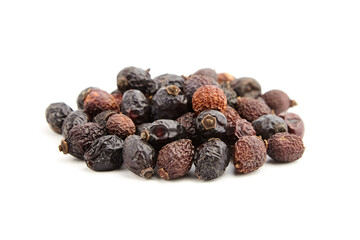 Dried rose hip fruits herbal tea isolated on white