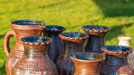 Brown clay mug and vases.