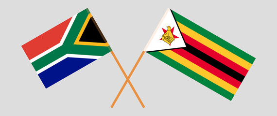 Crossed flags of South Africa and Zimbabwe. Official colors. Correct proportion