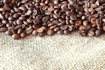 Close-up coffee beans lying on burlap